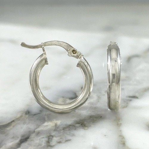 Disc hoop earring